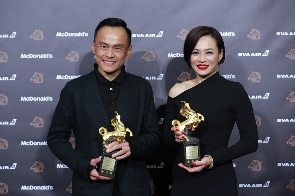 Taiwanese actor Chen Yi Wen and Malaysian actress Yeo Yann Yann (right) pose with their trophies at the 56th Golden Horse film awards at Taipei on November 23, 2019. — AFP pic